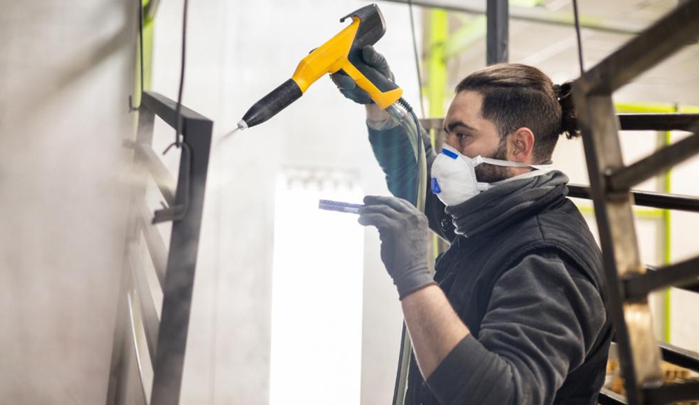 Industrial powder coating system operating in Dubai metal finishing facility
